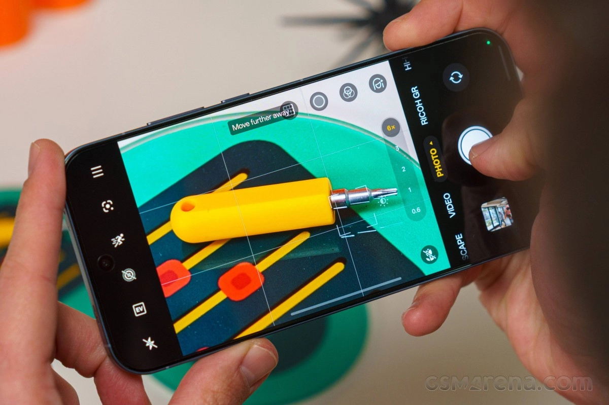 Realme GT 9 Pro camera app interface with yellow screwdriver