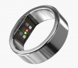 Ultrahuman Ring Pro silver fitness tracker with sensors.