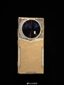 Dreame gold luxury phone with crystal camera module.