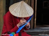 Vietnamese person in conical hat, Phu Quoc island.