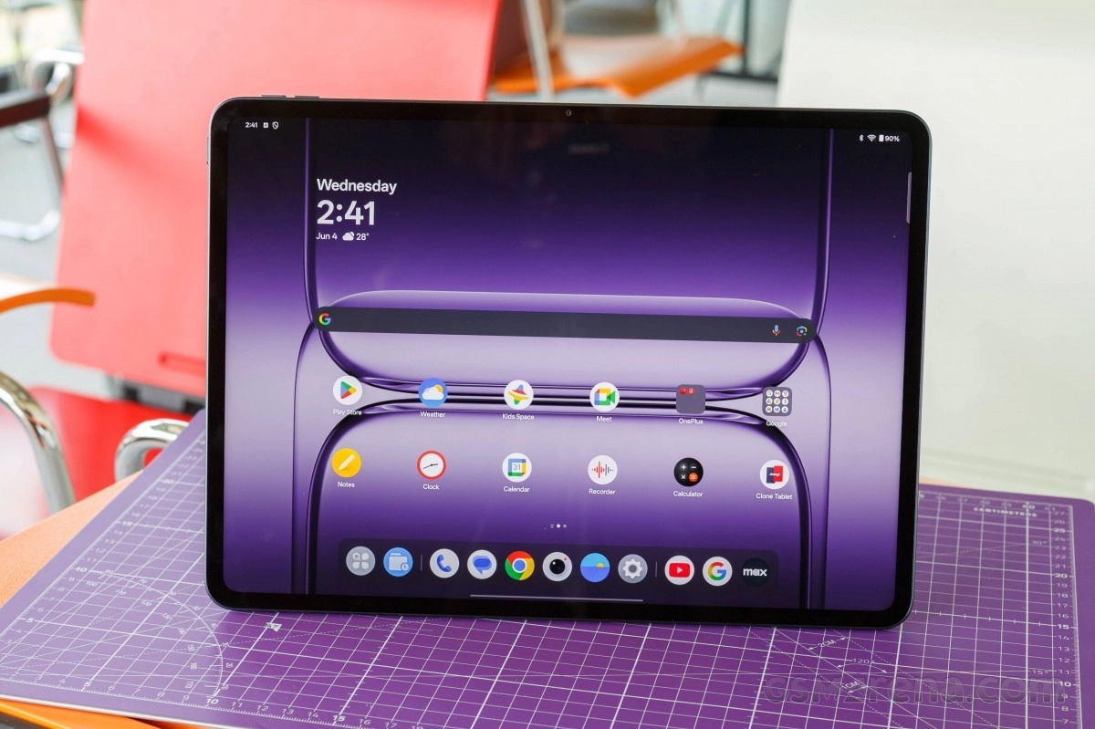 OnePlus tablet displaying date, time, and apps.