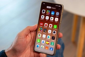 Gold Oppo Find N6 phone showing app screen.