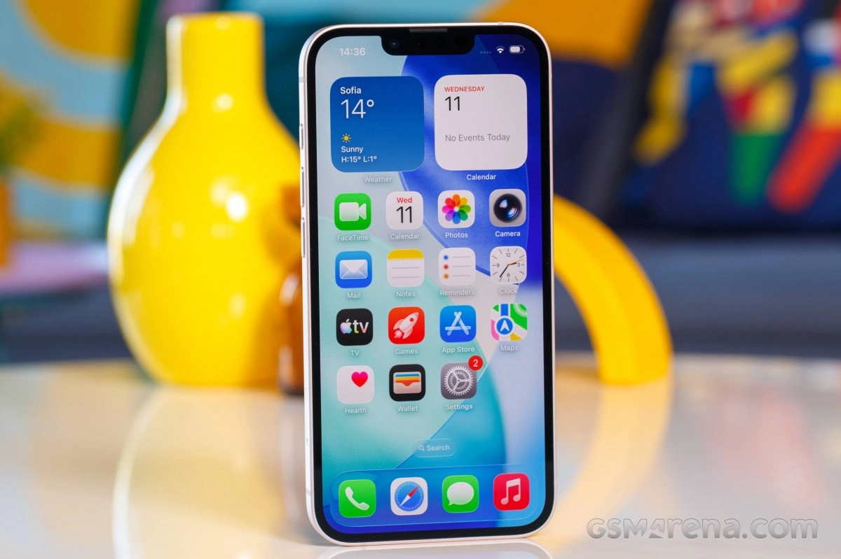 White iPhone display showing home screen apps