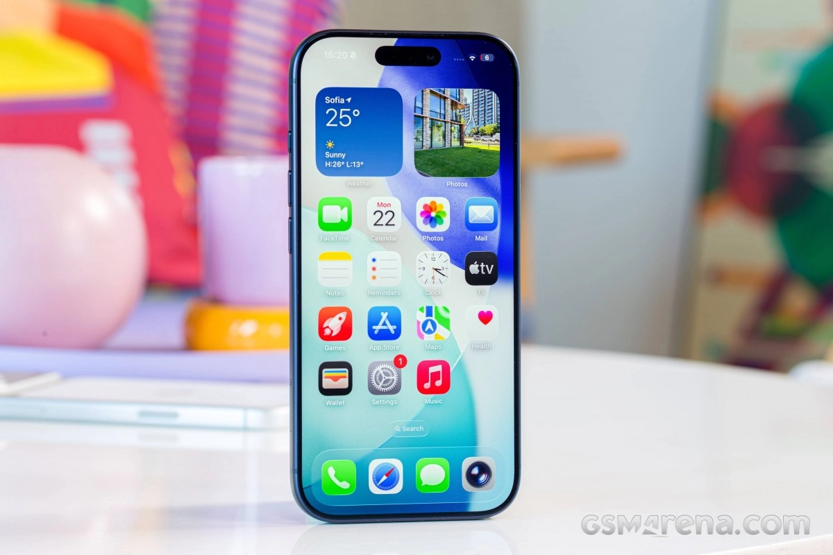 iPhone 15 screen showing iOS 26.4 with updated widgets.