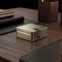 Ultrahuman Ring Pro charger on desk.