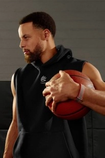 Stephen Curry wearing Google's Whoop competitor wristband.