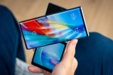 LG Wing dual screen phone held by user.