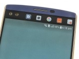 Close-up of LG phone screen with icons.