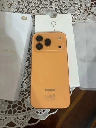 Orange Honor 600 Pro phone with triple camera.