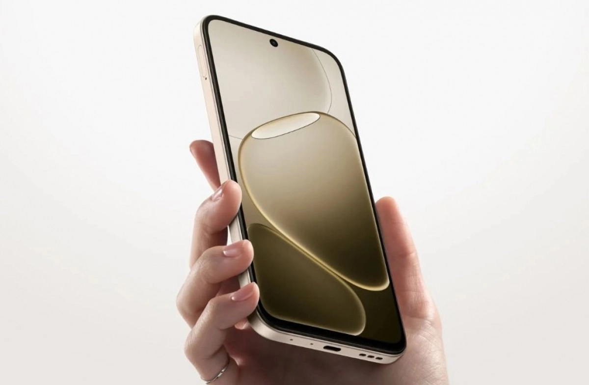 Oppo A6k variant gold smartphone held.