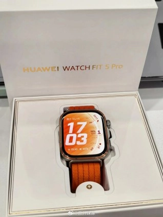 Huawei Watch Fit 5 Pro with orange band.