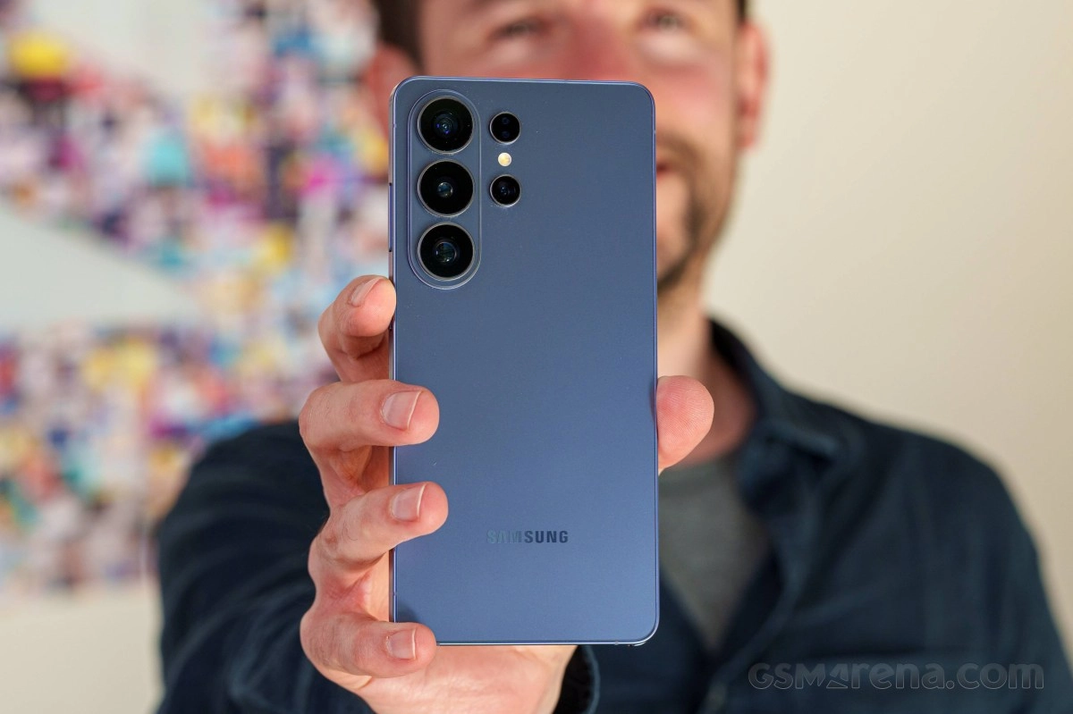 Samsung phone with multiple rear cameras held up