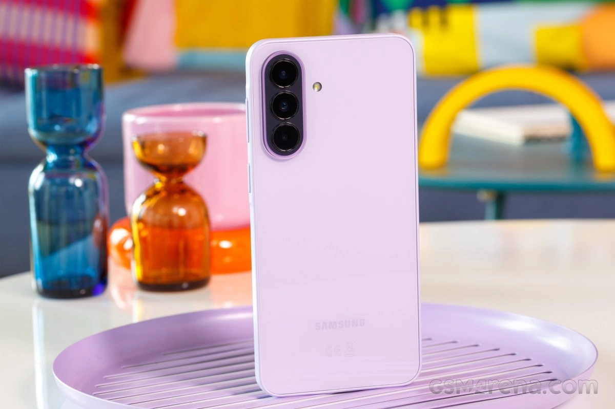 Purple Samsung Galaxy A-series phone, triple camera back.