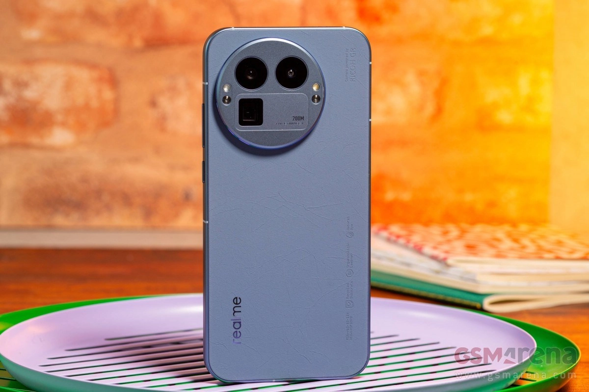 Blue Realme smartphone with large camera module.
