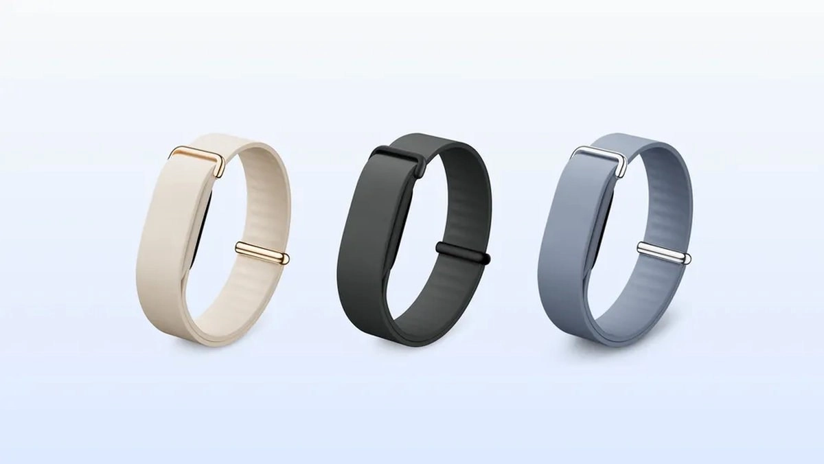 Fitbit Air fitness trackers in three colors.