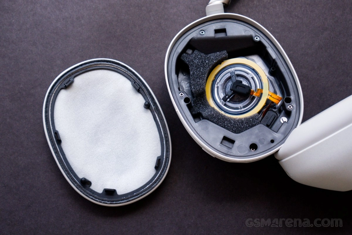 Apple AirPods Max earcup internals, earpad removed.