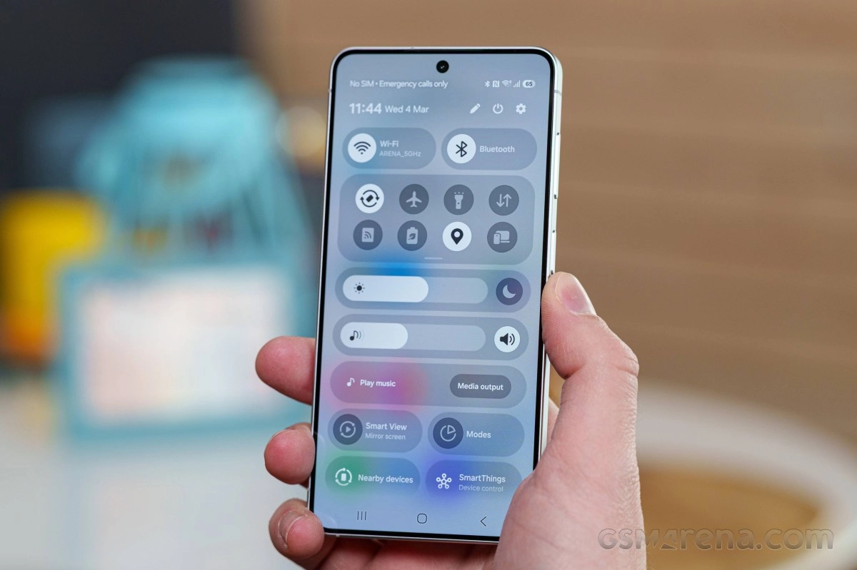 Samsung phone screen with quick settings menu.