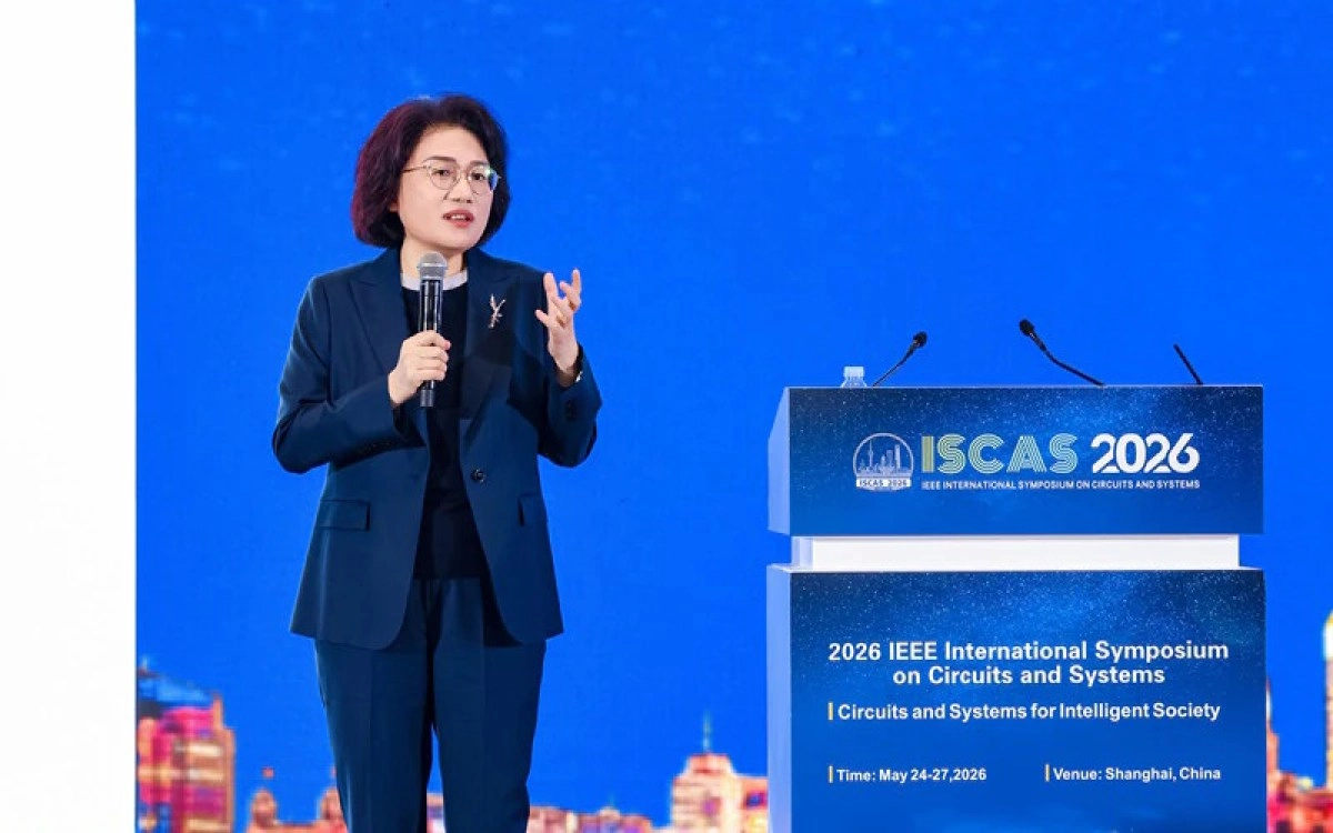 Speaker at ISCAS 2026 discussing chip technology.