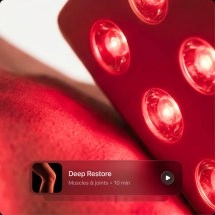 Ultrahuman Photon red light therapy device on skin.