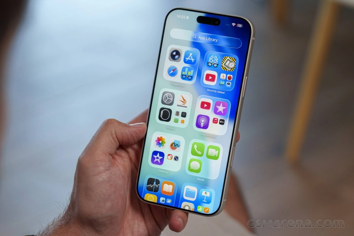 iPhone App Library showcasing Liquid Glass UI