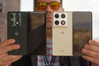 Two Motorola Razr fold phones, green and gold.
