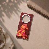 Honor Magic phone with horse design and ring.