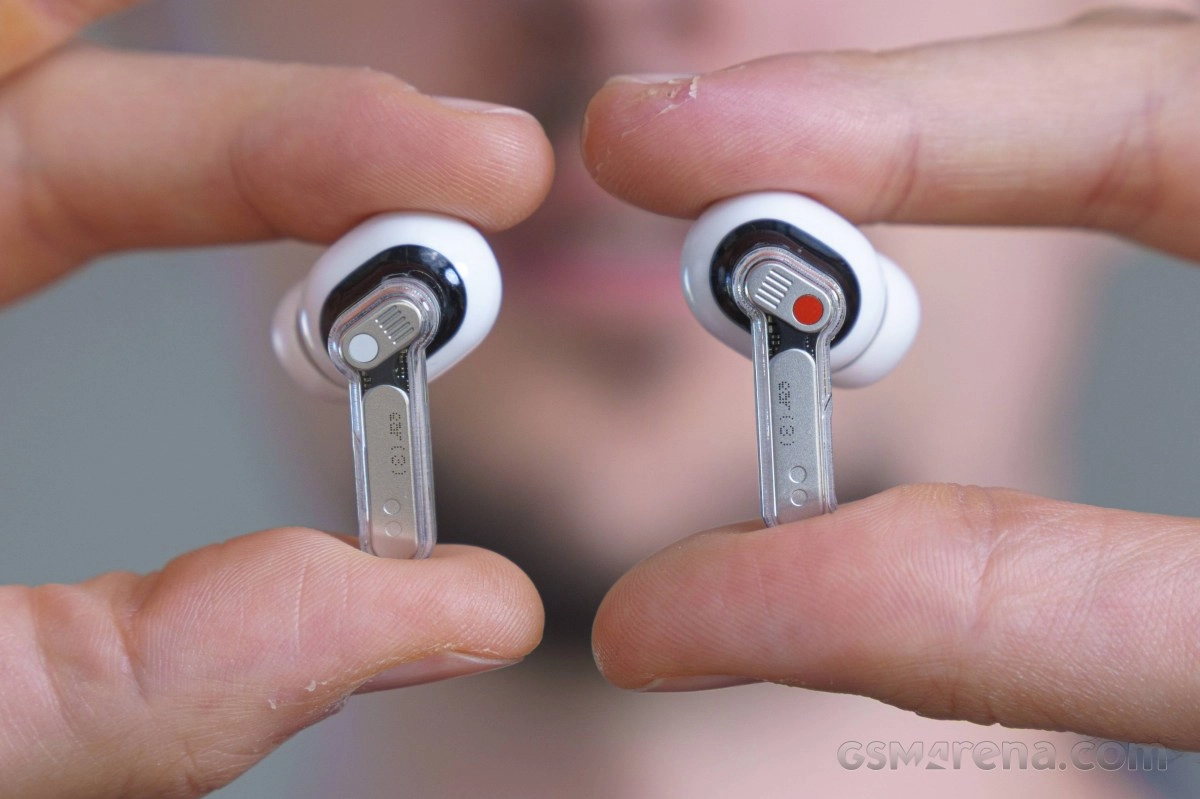 Nothing Ear (3a) earbuds in white and black.
