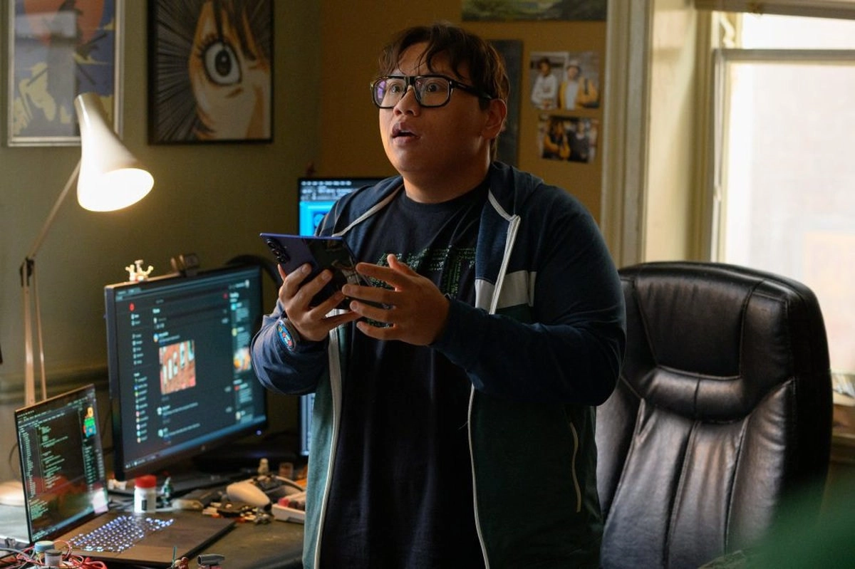 Ned Leeds holding Samsung foldable phone.