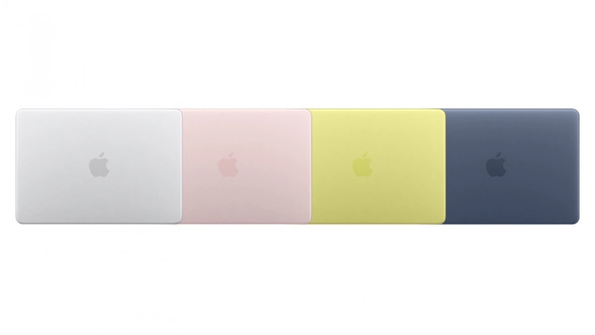 Four colorful MacBook Air laptops lined up.