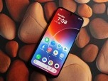 OnePlus N6 smartphone with colorful wallpaper.