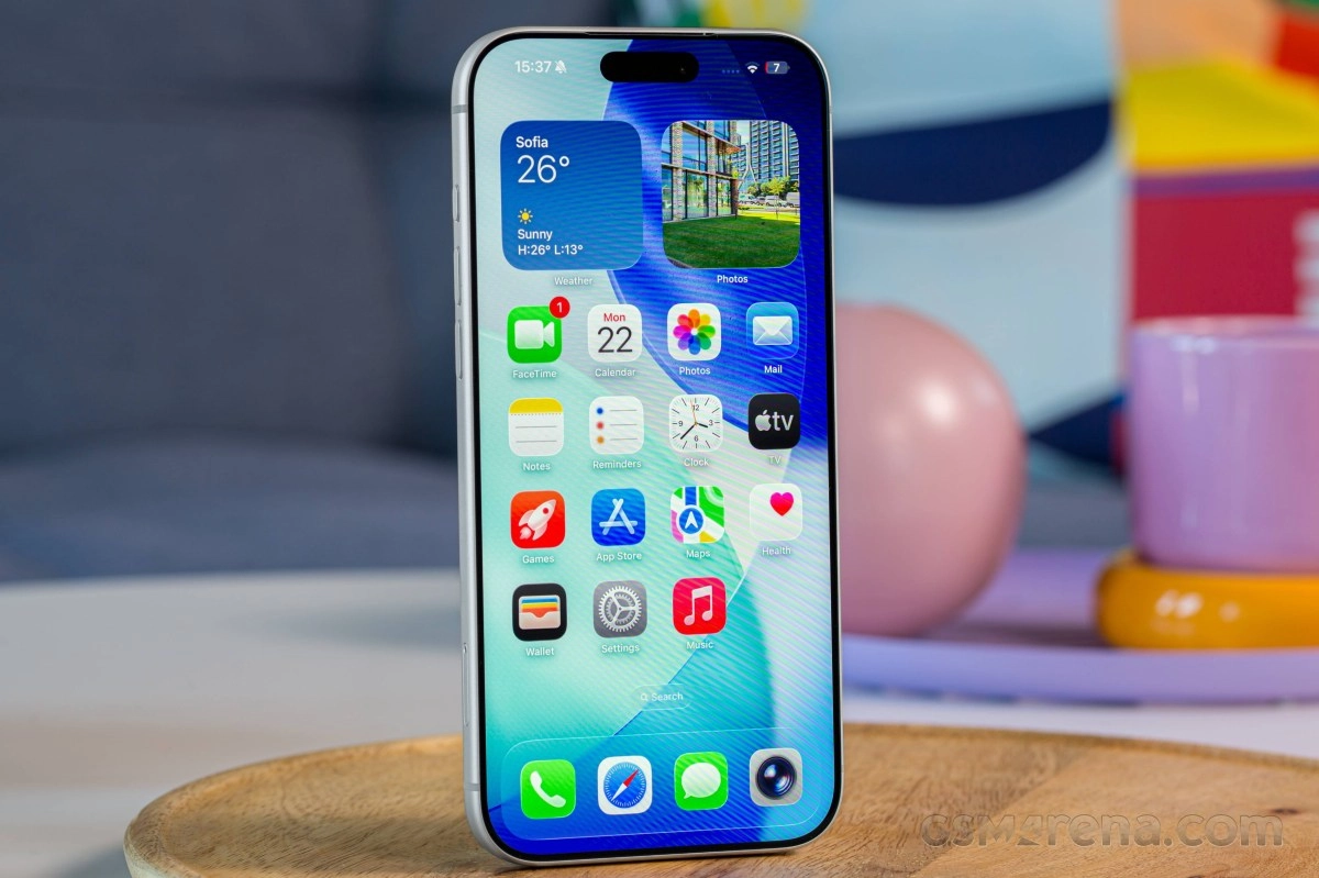 iPhone 18 Pro Max screen with app icons and weather.
