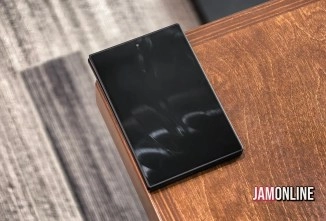 Black Galaxy Z Fold8 dummy on wooden surface