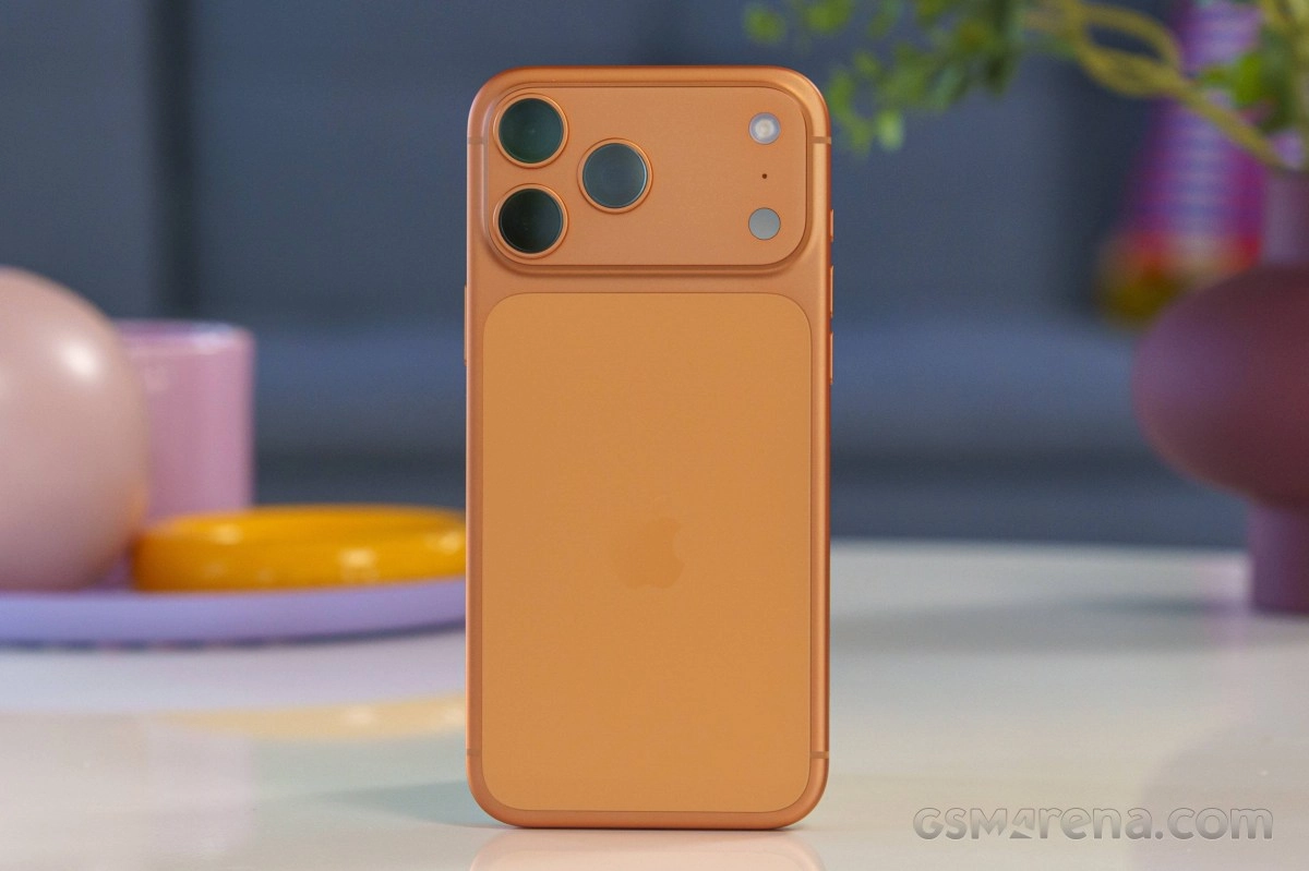 Orange iPhone 18 Pro Max back with triple camera.
