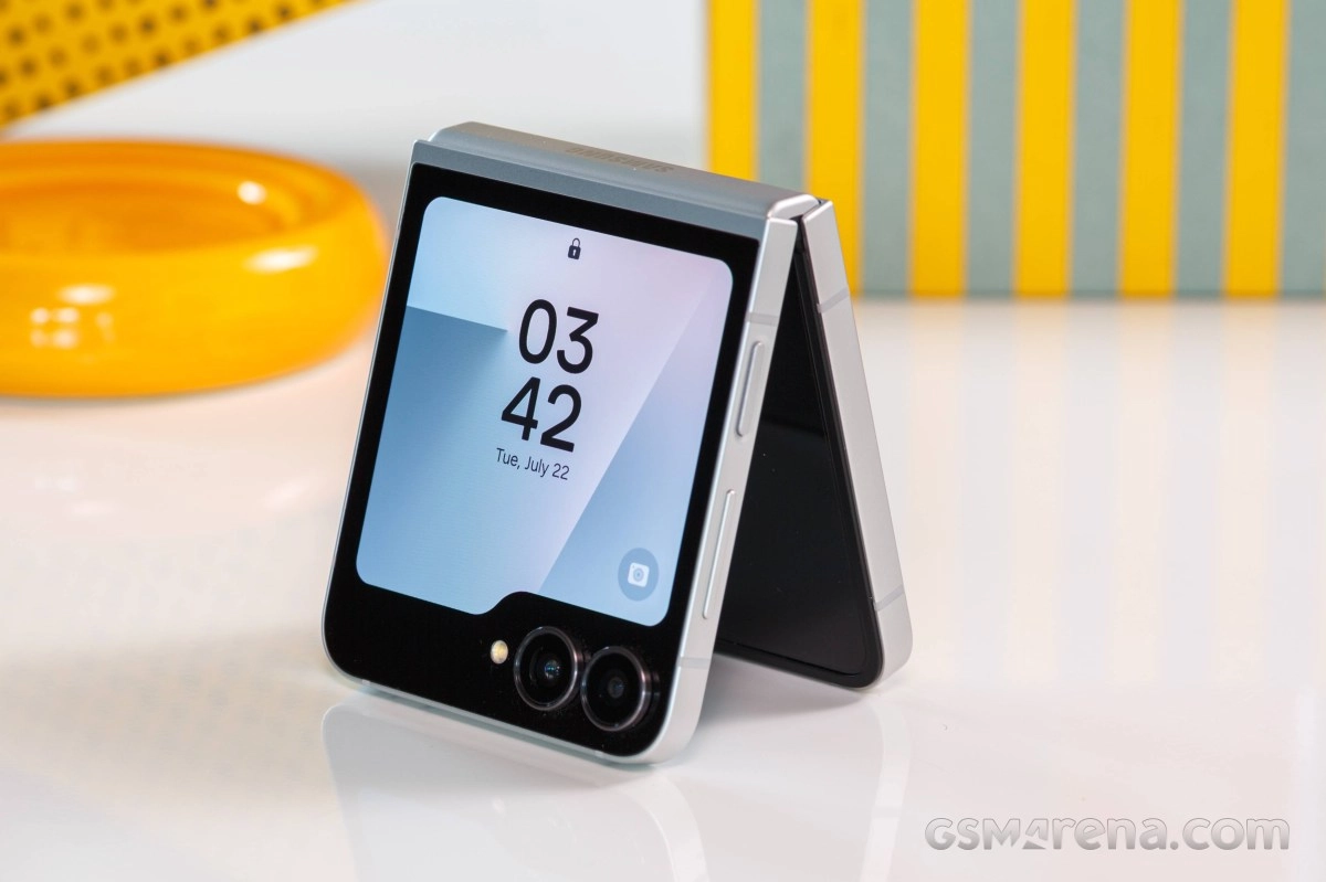 Samsung Galaxy Z Flip with screen showing time.