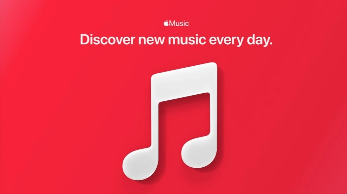 Apple Music logo and tagline on red background.
