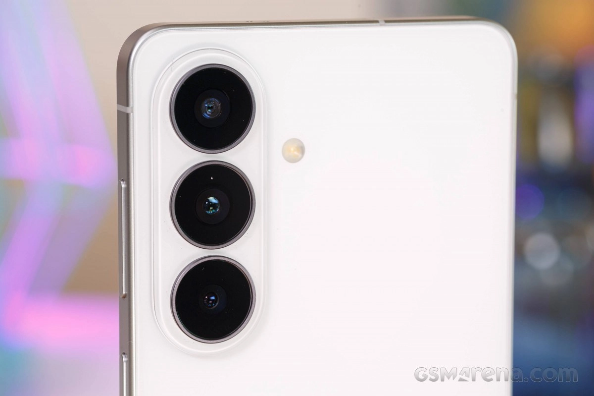 White Samsung phone triple camera setup