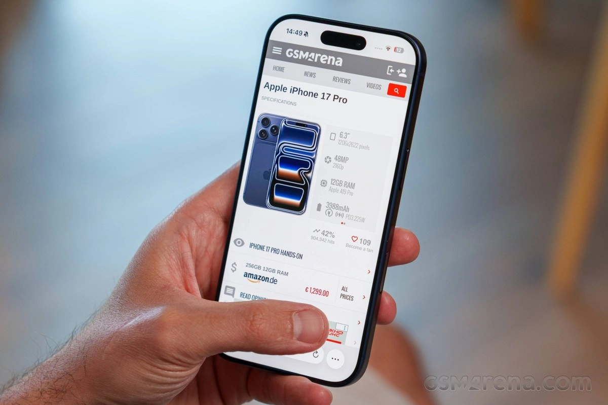 Hand holding phone showing Apple iPhone 17 Pro specs