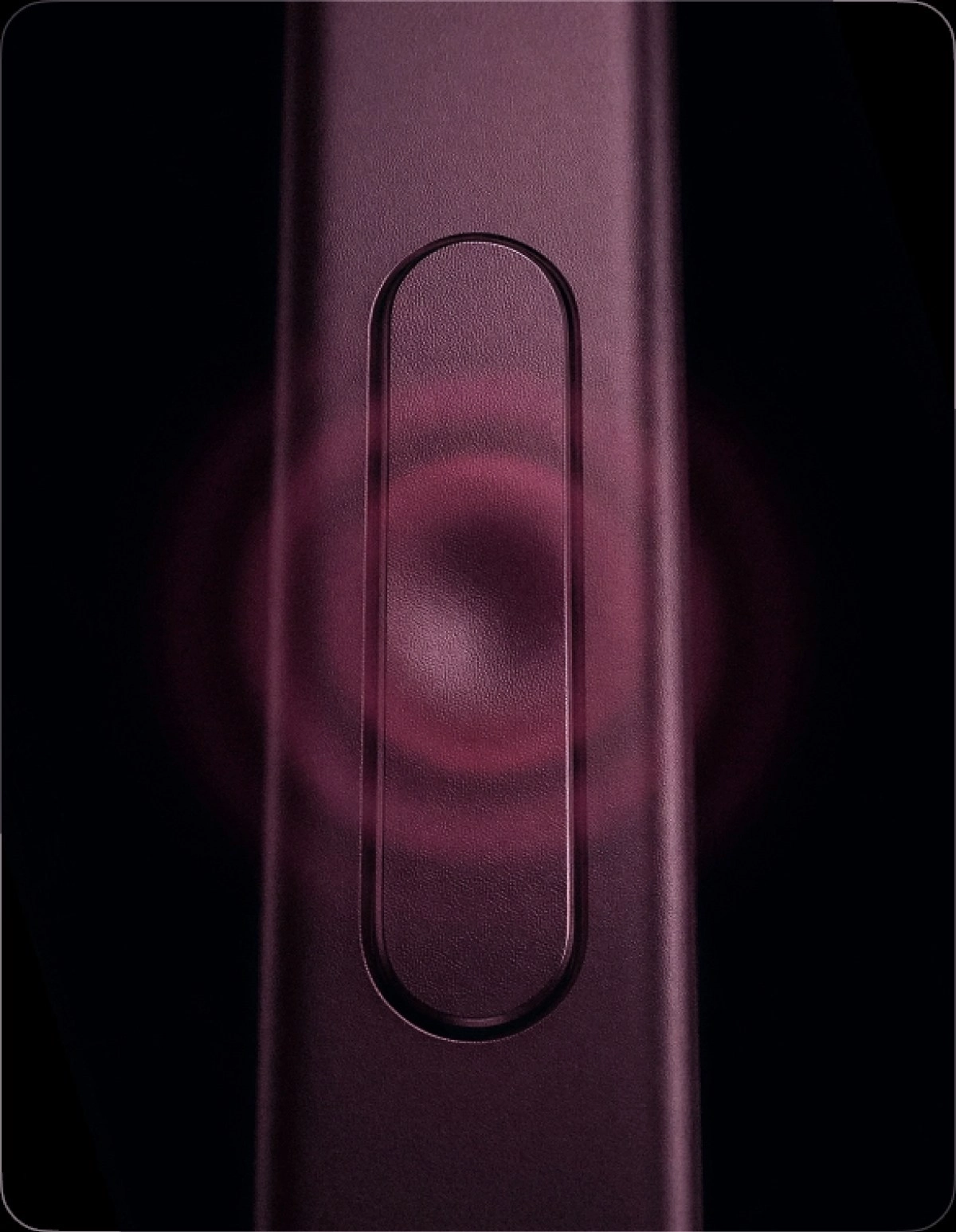 Dark pink textured luxury iPhone Ultra detail.