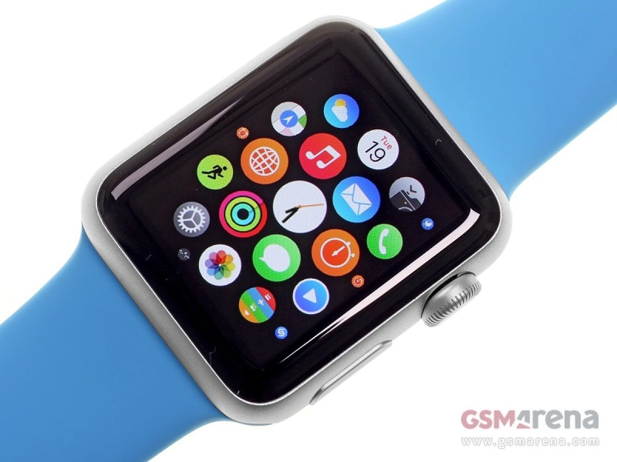 Apple Watch with blue band and app icons.