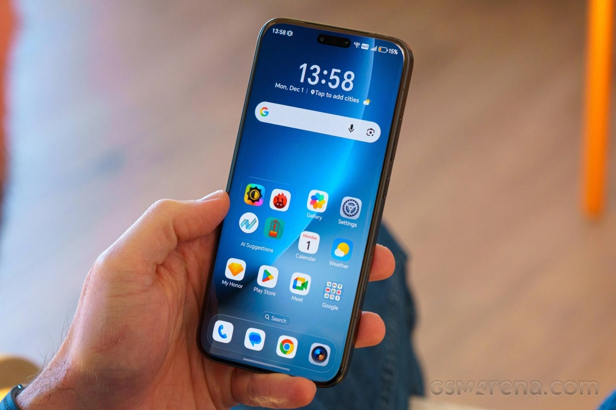 Honor Magic9 Pro smartphone with app icons.