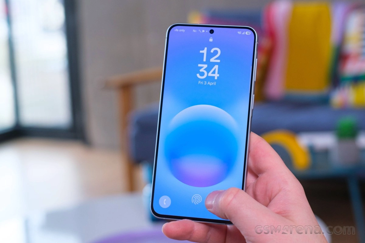 Samsung Galaxy A57 phone with One UI 9 beta lock screen.