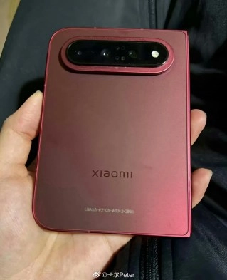 Red Xiaomi 18 Fold phone back with triple camera.