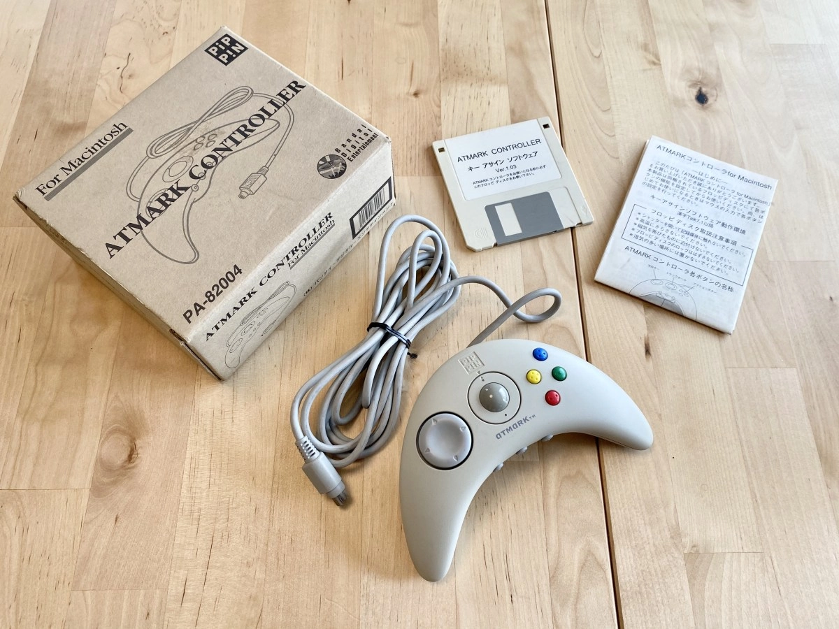 Atmark controller for Macintosh with box and floppy.