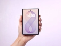 Foldable phone with infinity symbol wallpaper.