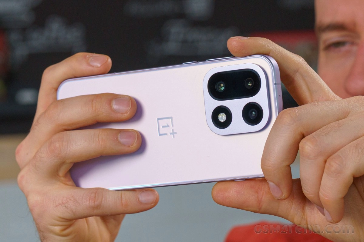 Leaked OnePlus 16 phone, purple color, quad camera.