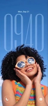 Smiling woman on smartphone lock screen