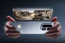 OnePlus 16 phone in hands playing game