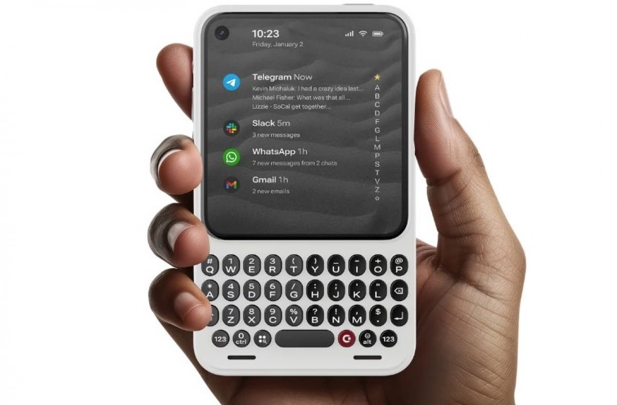 Clicks Communicator phone, white, with physical QWERTY keyboard.