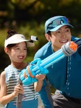 Girl wearing Dreame Leaptic Cube action camera with man.