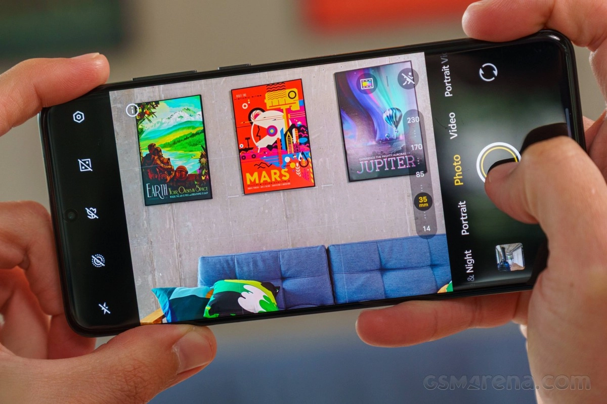 Hands using vivo X300 Ultra camera app.